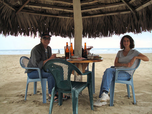 Mary Ann and me lunching on the beach in Olon